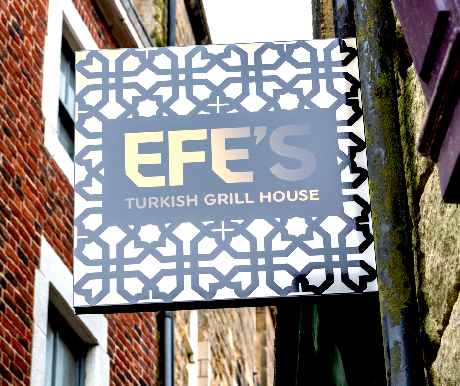 Projecting sign outside a shop